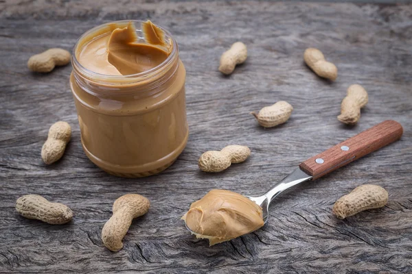 Peanut cream in a jar. Dietary foods for the heart. – stockfoto