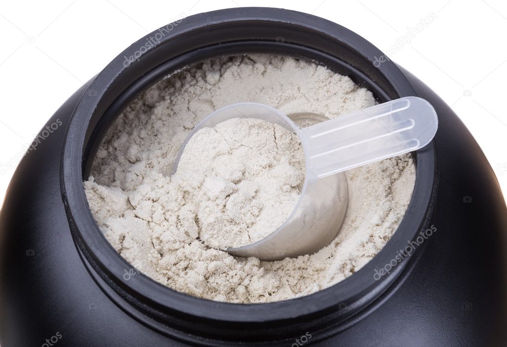 Container of milk whey protein. Close-up.