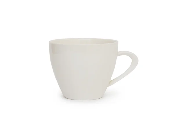 Белая чашка на белом фоне — стоковое фото