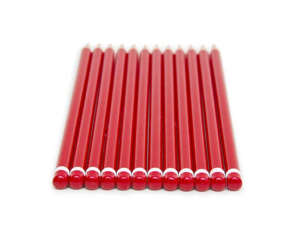 Röda pennor, isolerade — Stockfoto