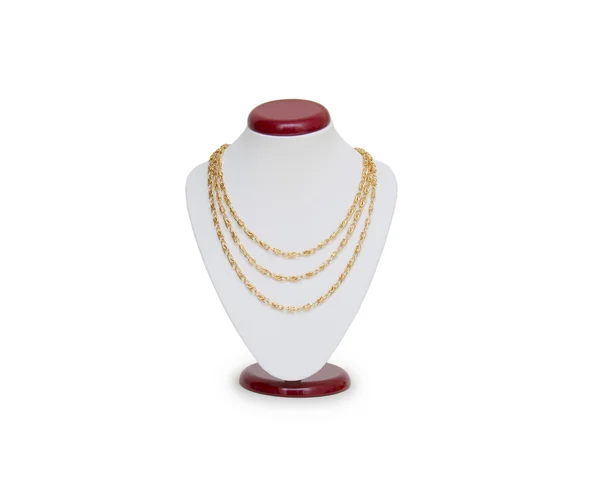 Beautiful golden necklace on mannequin isolated on white — Stock Photo, Image