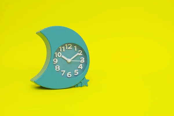 Clock isolated on the yellow — Stock Photo, Image