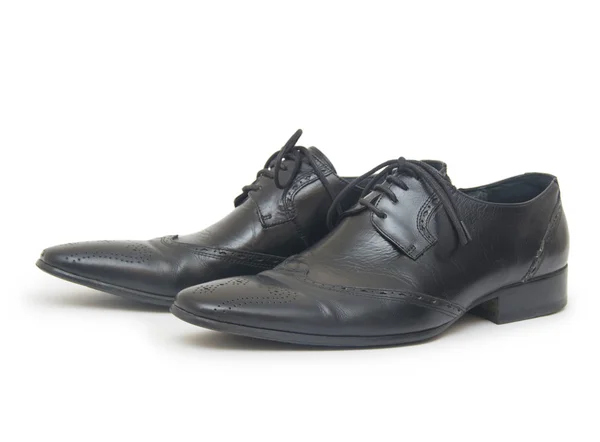 Close-up de sapatos masculinos no fundo branco — Fotografia de Stock