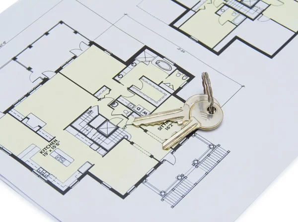 Key on house plan — Stock Photo, Image