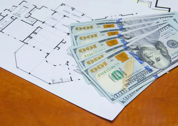 Money on house plan — Stock Photo, Image
