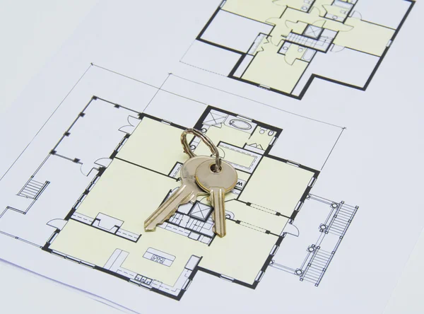 Key on house plan — Stock Photo, Image