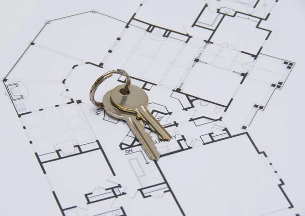 Key on house plan — Stock Photo, Image