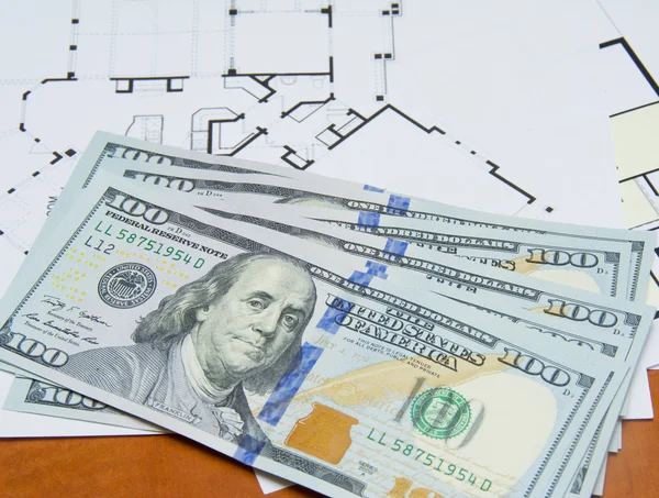 Money on house plan — Stock Photo, Image
