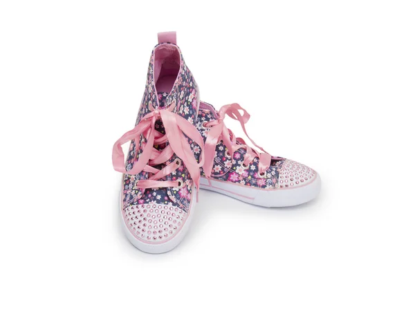 Par de zapatos deportivos rosa sobre fondo blanco —  Fotos de Stock
