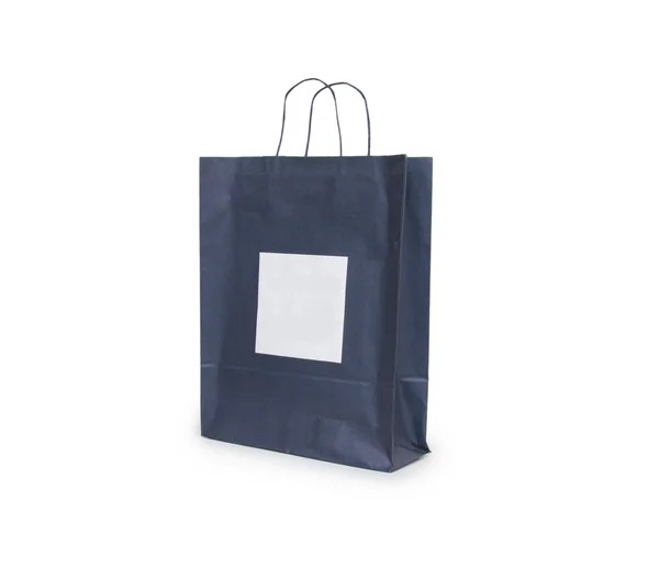Black paper bag with handles on a white background — Stock Photo, Image