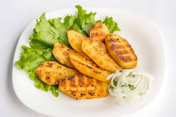 Fried potato on a plate — Stock Photo, Image