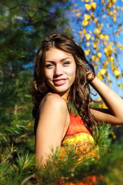 Happy young woman in the autumn wood of the mountain — Stock Photo, Image