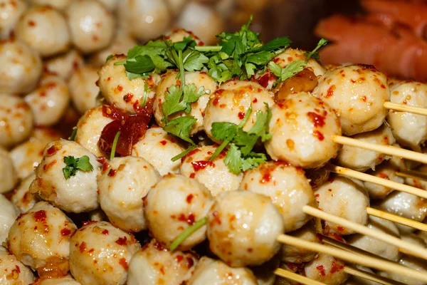 Fried meat balls a grill on a stick in sauce — Stock Photo, Image