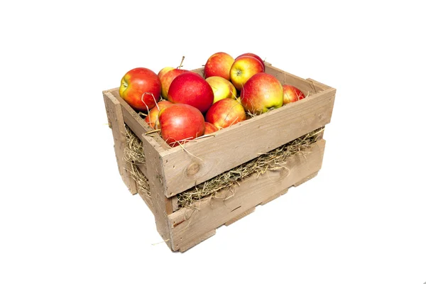 Red apples in wooden crate — Stock Photo, Image