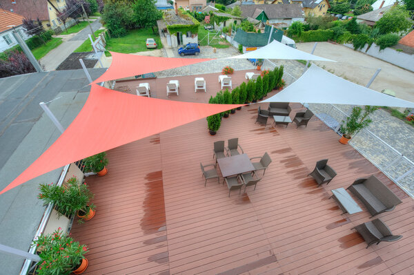 Terrace in summer with shade sails