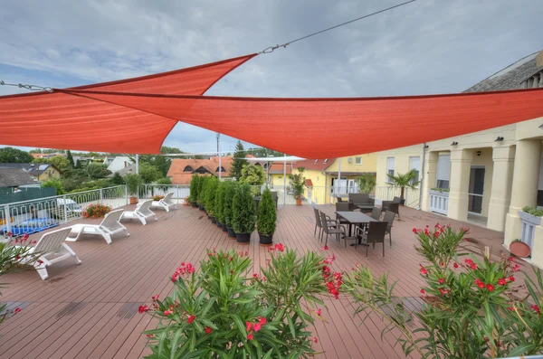 Terrace in summer with shade sails — Stock Photo, Image
