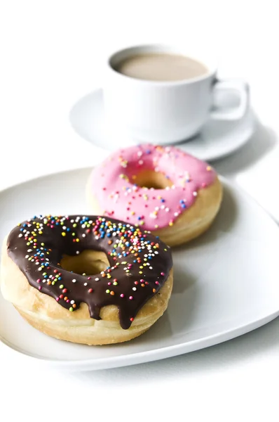 Donuts and coffee cup — Stock Photo, Image