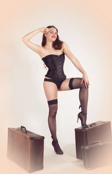 Young pin-up women with suitcase — Stock Photo, Image