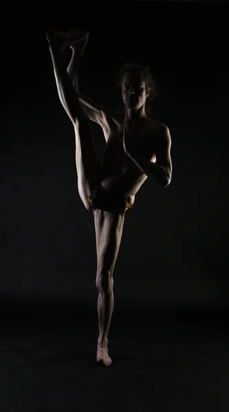 Young man practicing yoga — Stock Photo, Image