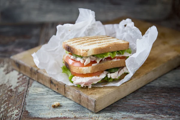 Chicken Club Sandwich on old wooden — Stock Photo, Image