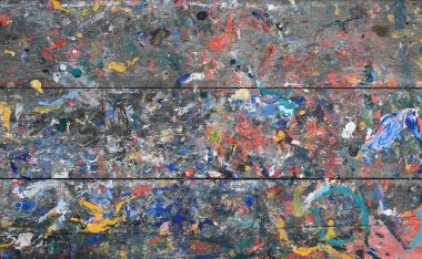 Ahşap masaya akrilik renk sıçrat. Soyut renkli doku arkaplanı.