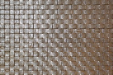 Kahverengi deri arka planda örülmüş ya da dokunmuş doku.