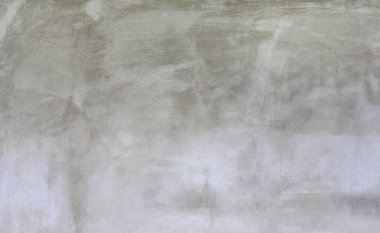 Yüzey dokusu arka planında çizikler olan soyut beton duvar.