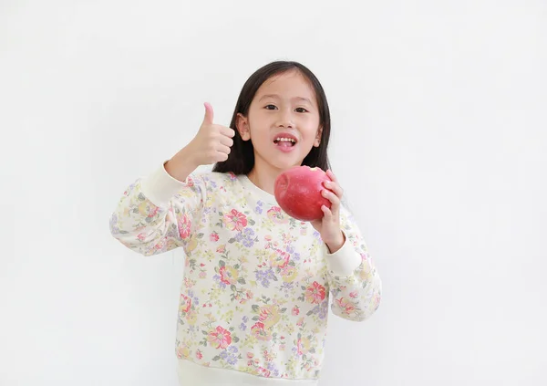 Menina Criança Comendo Maçã Vermelha Fresca Fazendo Sinal Polegar Para — Fotografia de Stock