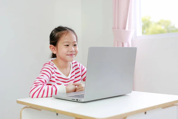 Happy Little Asian Child Girl Sitting Desk Using Laptop Computer — Stock Photo, Image