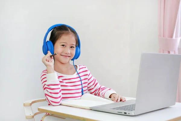 Portrait Asian Little Child Wearing Headphone Holding Pencil Looking Camera — Stock Photo, Image