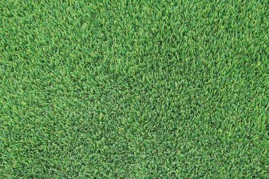 Arka plan olarak yapay yeşil çimen dokusu. Üst görünüm