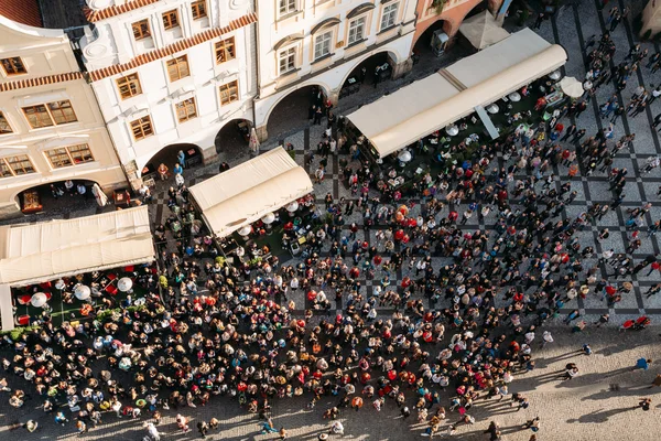 Top View of large group of tourists at Prague old town square lo