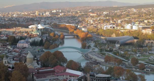 Tbilisi, Georgia. Top View Of Famous Landmarks In Autumn Evening. Georgian Capital Skyline Cityscape. Justice House, Bridge Of Peace, Concert Hall, Rike Park And Presidential Palace — Stock Video