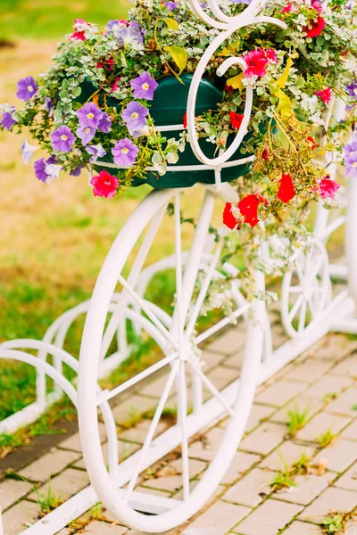 White Decorative Bicycle Parking In Garden