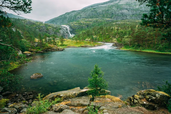 Husedalen - Valley of waterfalls Norway. Giant Tall Waterfall