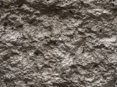 Geçmişi. Gümüş duvar, düzensiz taş.