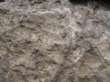Geçmişi. Gri, düzensiz taştan duvar