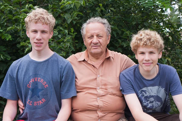 Grandfather and his beloved ones boys — Stock Photo, Image