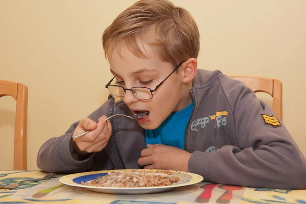 Boy is eating — Stock Photo, Image