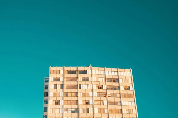 Building texture wallpaper against blue sky back