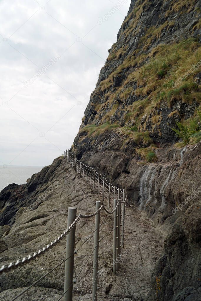 The Gobbins is a cliff path in Islandmagee, County Antrim, Northern Ireland, on the Causeway Coastal Route. It passes over bridges, past caves and through a tunnel along the Gobbins Cliffs.