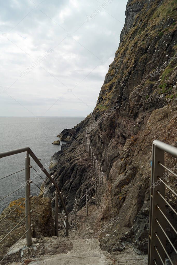 The Gobbins is a cliff path in Islandmagee, County Antrim, Northern Ireland, on the Causeway Coastal Route. It passes over bridges, past caves and through a tunnel along the Gobbins Cliffs.