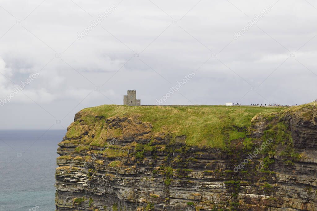 The Cliffs of Moher are the best known cliffs in Ireland. They are located on the southwest coast of Ireland's main island in County Clare, near the villages of Doolin and Liscannor. The O'Brien's Tower is commissioned at the highest point of the cli