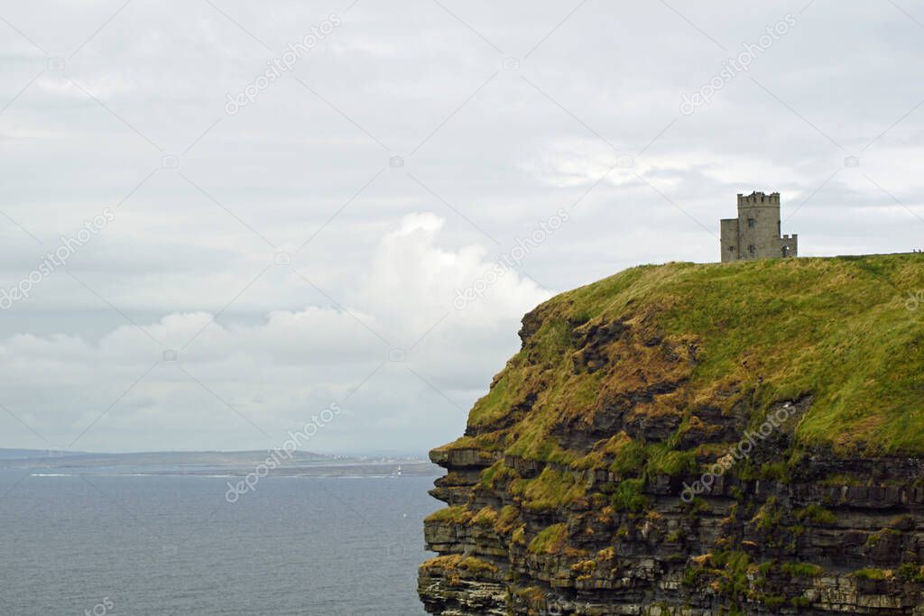The Cliffs of Moher are the best known cliffs in Ireland. They are located on the southwest coast of Ireland's main island in County Clare, near the villages of Doolin and Liscannor. The O'Brien's Tower is commissioned at the highest point of the cli