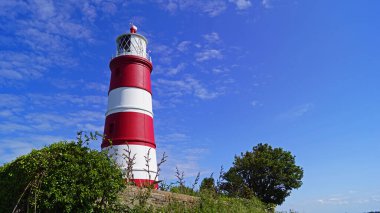 Norfolk 'un kuzey kıyısındaki Happisburgh Deniz Feneri, İngiltere' de bağımsız olarak işletilen tek deniz feneridir..
