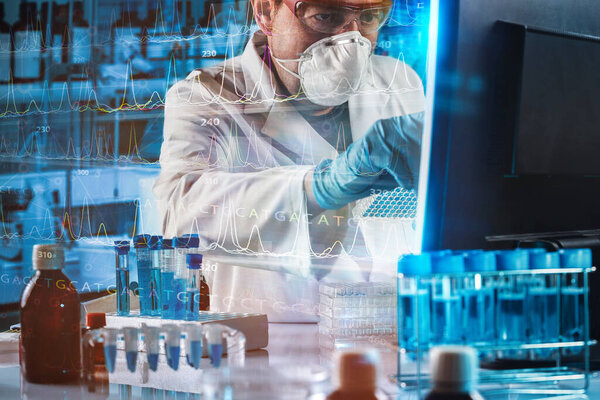 Doctor consults screen with virtual results report. Medical report concept in digital results. Research scientist works on a digital DNA report with results represented in virtual hologram in the lab