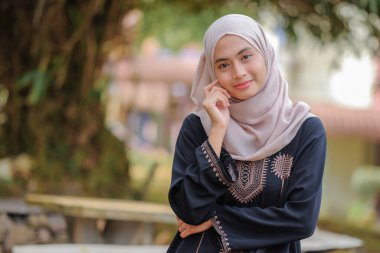 Portrait of Muslim beauty woman wearing hijab clipart