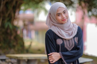 Portrait of Muslim beauty woman wearing hijab clipart