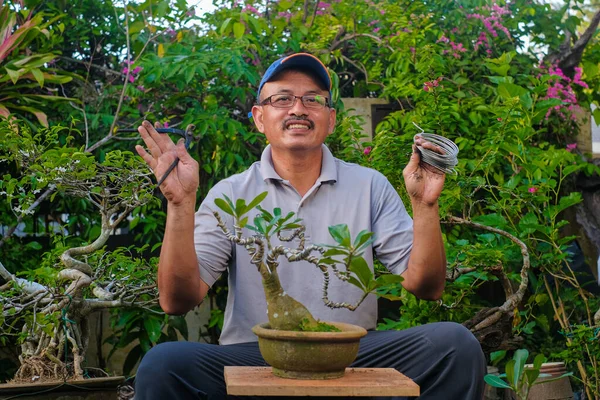 Senior Man Taking Care Bonsai Plant Garden — Stock fotografie