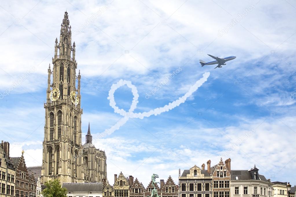 A plane flys always form the city anvers, belgium